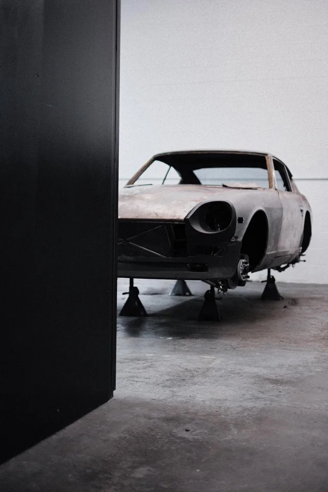 Ripley on stands in the garage